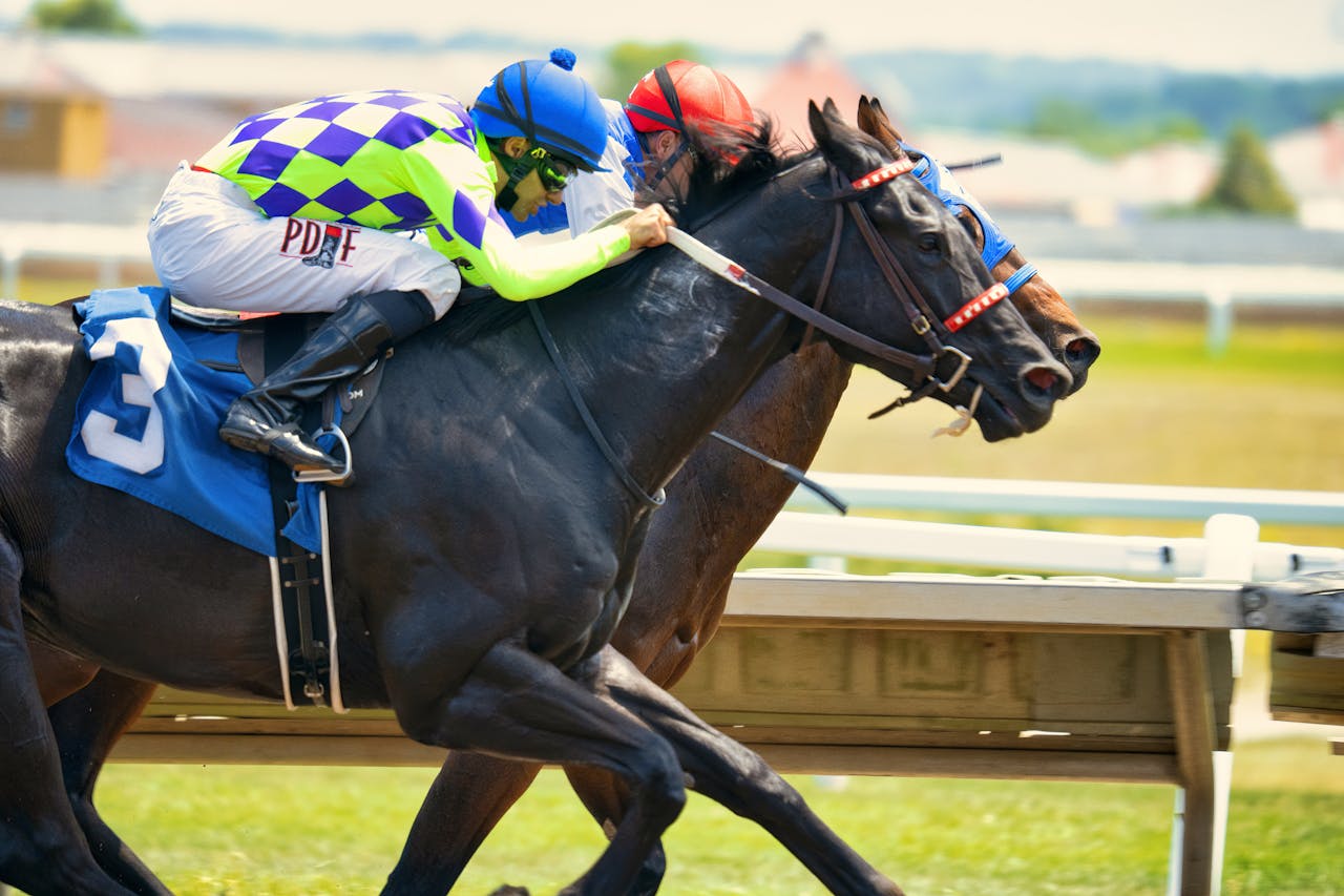 Intense horse race with jockeys competing in Shakopee, MN, USA.